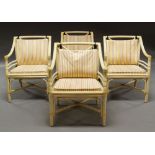 A set of eight Regency style white painted bamboo armchairs, with upholstered cushions,