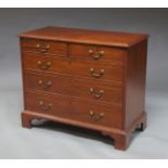 A Georgian mahogany chest of drawers, with two short and three long graduated drawers,