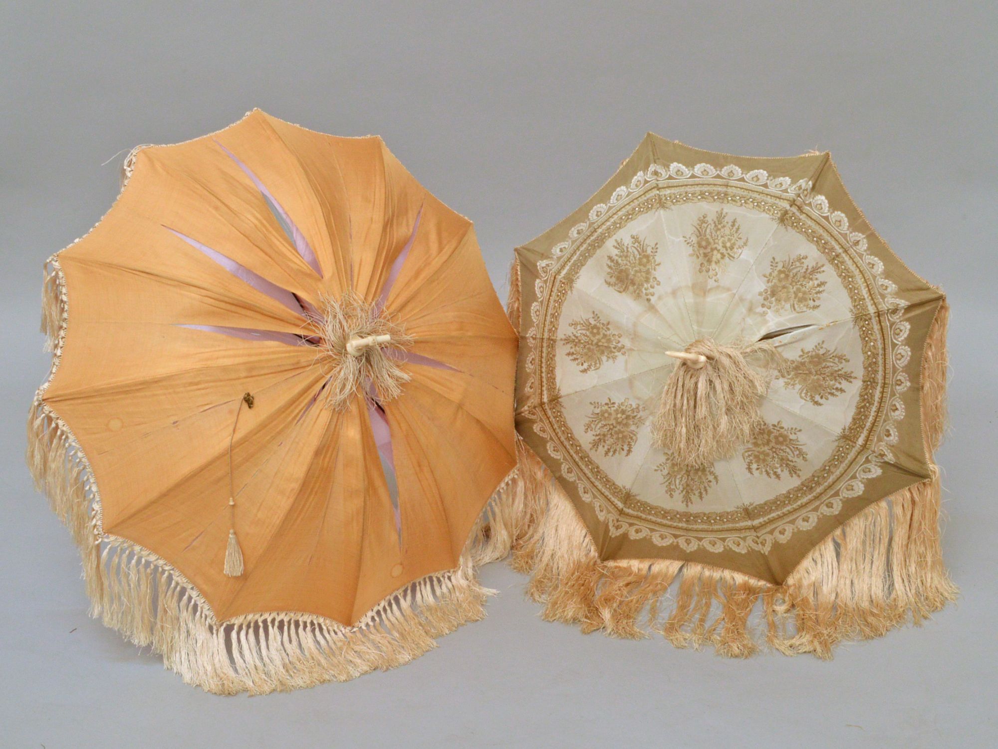 A 19th century silk parasol, with carved reeded ivory handle, by Sangsters, approx 70cm long,