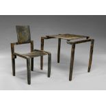 A wrought iron and sheet metal table and chair, late 20th century 73cm high x 89cm wide x 67cm deep,
