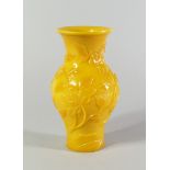 A Chinese Peking glass yellow monochrome baluster vase, 20th century, decorated thoughout with