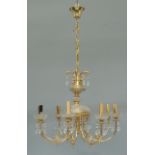 A gilt metal and glass eight light chandelier, mid/late 20th century, with central column of waist