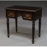 A Colonial style hardwood table, late 20th century, with rectangular top, carved with lobed edge,