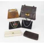 A collection of eighteen handbags, to include an unusual 1930s leather handbag, with amber