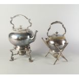 A silver plated spherical hot water kettle, late 19th/20th century, with shaped handle, on a