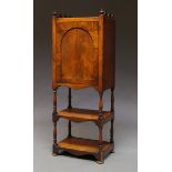 A Victorian mahogany cupboard what not, with galleried top with turned finials, above panelled