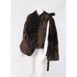 A mole skin fur gilet and matching cape, together with a cashmere sweater, fully beaded, a c.1960s