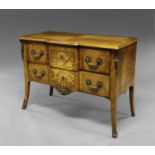 A French Louis XV breakfront kingwood and marquetry commode, the front inlaid with a medallion of