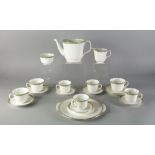 Minton a Milford pattern part tea set to comprise a tea pot lacking cover, four tea cups, four