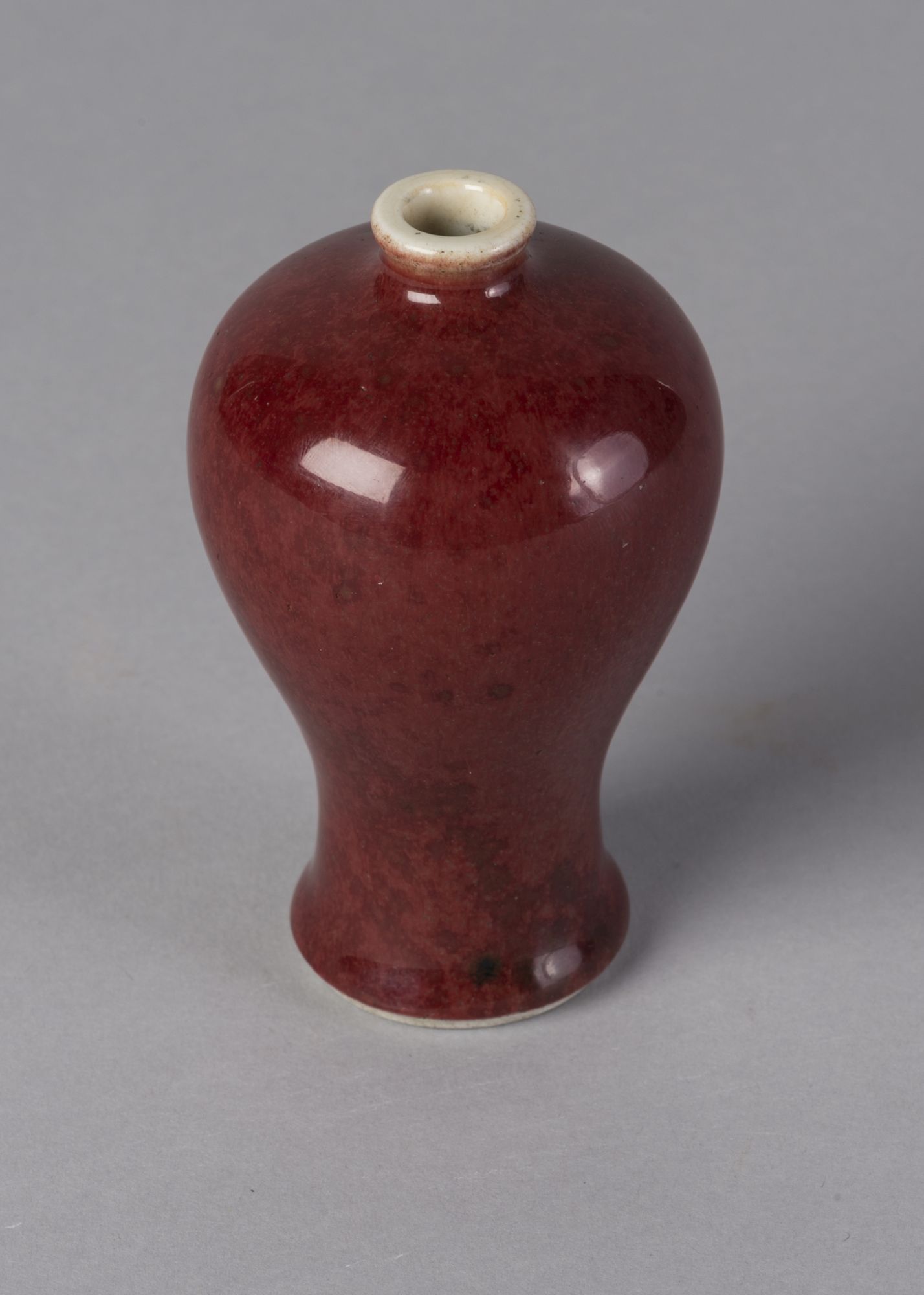 A Chinese sang-de-boeuf miniature meiping vase, Kangxi mark and period, - Image 2 of 3