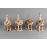Four Chinese pottery figures on horseback, Tang dynasty,