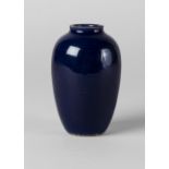A Chinese porcelain monochrome ovoid vase, 18th century, with all over dark blue glaze,