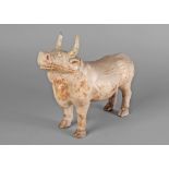 A Chinese straw-glazed pottery model of an ox, Sui/Tang dynasty,