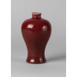 A Chinese porcelain sang-de-boeuf glazed meiping vase, 18th century, with rich red,