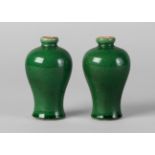 A pair of Chinese monochrome green glazed meiping vases, 18th century,