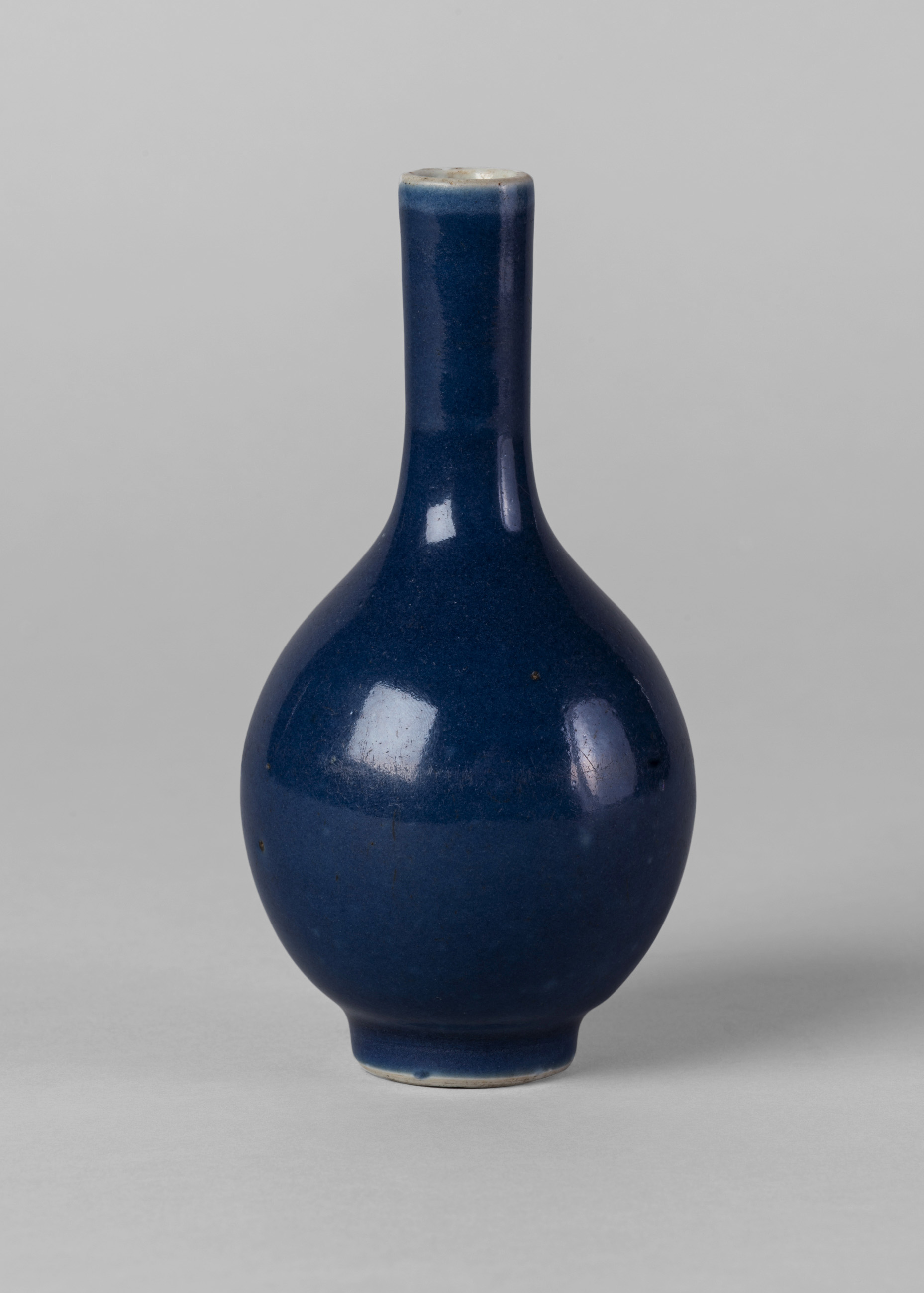 A Chinese porcelain monochrome powder blue bottle vase, 18th century,