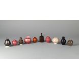 Yuta Segawa, Japanese b.1988, a group of miniature pots in glazed porcelain, each signed on the