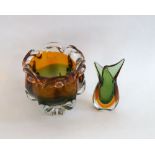 A footed lobed glass vase, late 20th/early 21st century, with everted rim, amber and green cased