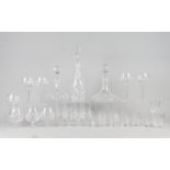 A large six setting suite of cut glass, 20th century, to include four decanters, two bowls, ash