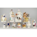 A collection of Staffordshire pottery figures, mostly late 19th century to comprise Samson and the