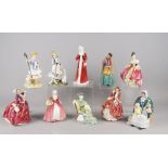 A collection of Royal Doulton figures, to include Southern Belle HN2229, Autumn Breezes HN1939,