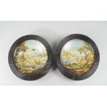 A pair of Italian maiolica plates, 18th/19th century, decorated with a hunt scene and a pastoral