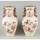 A large pair of Mason's vases, 20th century, with pierced dragon handles, overall decorated in