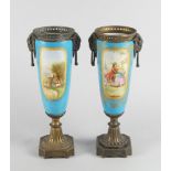 A pair of Sevres style porcelain and gilt metal mounted vases, late 19th century, with twin swing