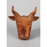 An Amlash-style pottery model of a bulls head, Iran, 32.