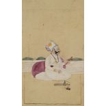 A Maharaja with flower and sword, Mewar, late 18th century, ink on polished paper,