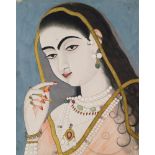 A portrait of a courtesan, Jaipur, 19th century, gouache on paper heightened with gilt,