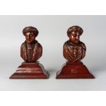 A pair of German carved wood busts of Turks, 19th century,