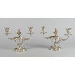 A pair of French taste silver plated twin light candelabra, late 19th/early 20th century,