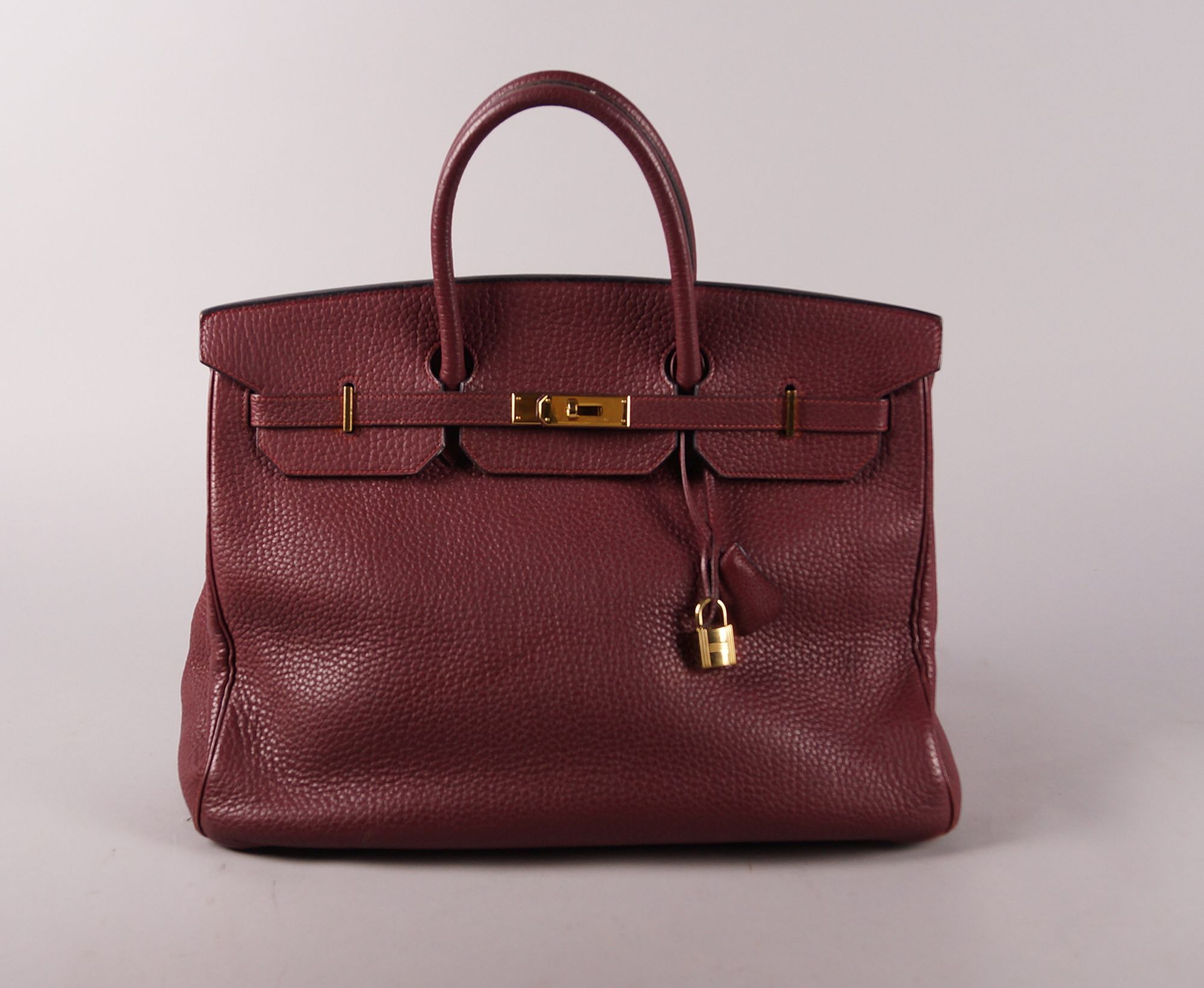 Hermes Birkin handbag, date code for 2000, burgundy Clemence leather with gold plated hardware,