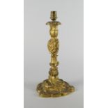 A French bronze candlestick, in the Louis XV style, 19th century, converted to a lamp,