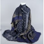 A Louis Vuitton silk, wool and silver thread shawl, LV monogram, boxed,