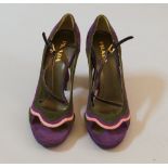 A collection of women's designer shoes, to include Prada, Givenchy, Jimmy Choo, Louis Vuitton,