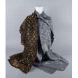 A Louis Vuitton silk, wool and gold thread shawl, LV monogram, boxed,