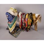 A collection of twelve various designer scarves, to include Emilio Pucci, Christian Dior, Gucci,