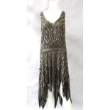 A 1920s beaded 'Flapper' cocktail gown, black chiffon with bugle bead and sequin decoration,