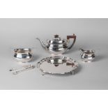 A silver three piece tea service, Birmingham c.1928, Hukin & Heath Ltd.