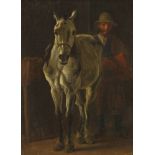 Dutch School, early 19th century- Grey horse and man in stable; oil on canvas laid down on panel,