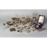 A large collection of miscellaneous silver, to include a planished twin handled porringer, London c.