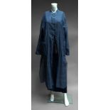 A light weight blue linen coat, by Nitya, with matching navy blue skirt and striped top,