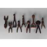 An African tribal catapult, the shaft decorated with chip carving and fluting designs,