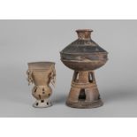 A Korean unglazed stoneware stem cup and lid, Silla Dynasty, 57BC-935AD,