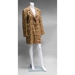 A Hermes wool and cashmere russet and buttermilk check coat, two button closure and slit pockets,