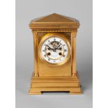 A French gilt bronze mantel clock by Maple and Co.