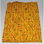 A Kente cloth, South Ghana, finely woven with rectangles of geometric patterns in blue,