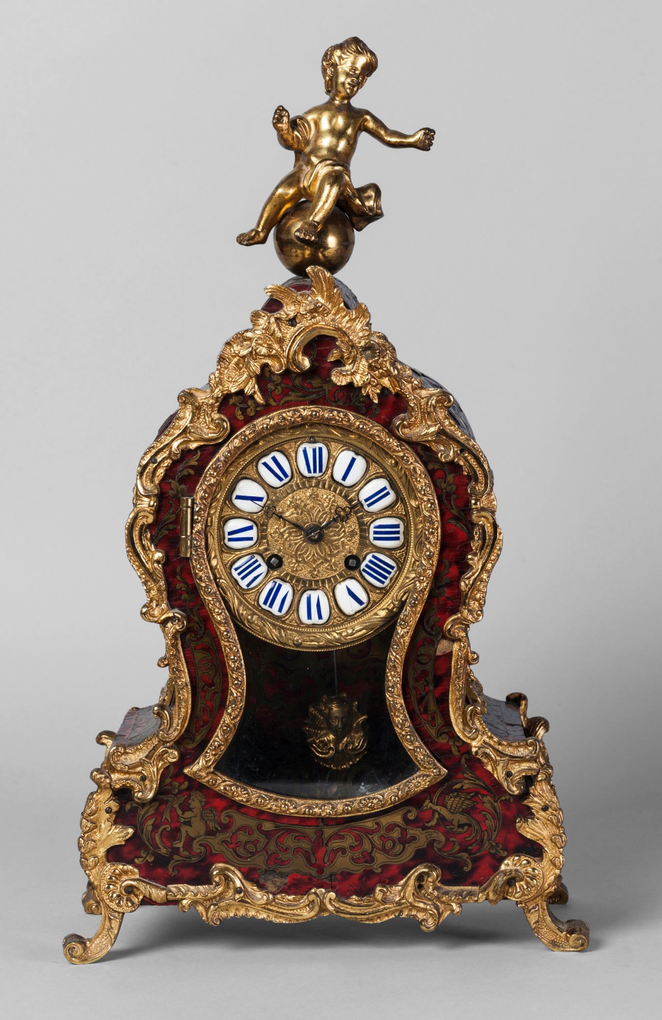 A French gilt metal mounted and red stained boulle work clock, 19th century,